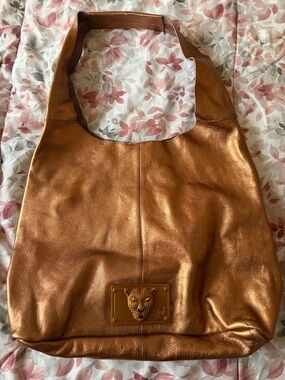 Sharif Metallic Copper Shoulder Bag with Lion Plaque